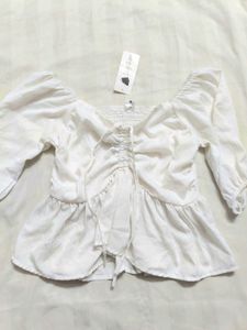 White Peplum Top