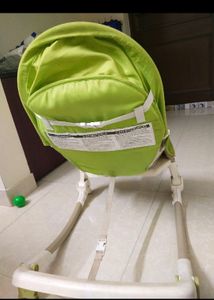 Baby Frocks And Rocker Chair