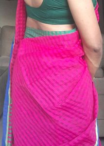 Red colour saree with multi coloured boarders,  fe