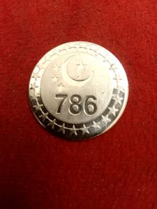 ANTIC SILVER PLATED COIN