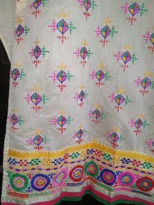 Lovely White Colour Kurti With Beautiful Embroidery Design On It