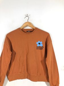 Studio Orange Floral Graphic Sweatshirt
