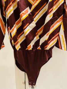 FOREVER 21 BODYSUIT IN M/L