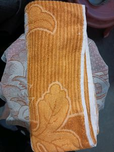 Premium orange coloured Towel