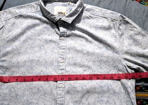 Branded printed leaf print shirt.