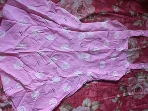 Pink Sundress with White Dot Pattern.