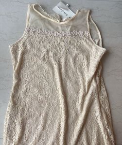 Brand new beige lace dress with pearls