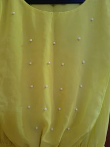 yellow cinched waist top