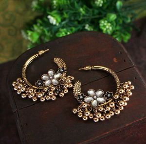 Gold Tone Floral Jhumka Earrings