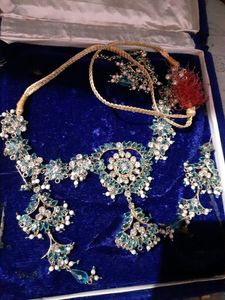 Lehenga Saree With Matching Jewellery.