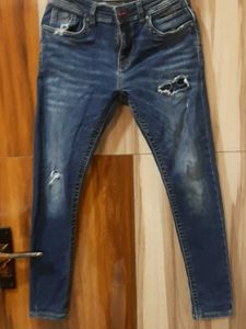 Ripped Blue Denim Jeans