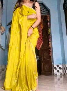 Elegant Yellow Embellished Saree