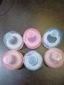 Nipples & Caps Of Feeding Bottles