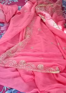 women peach color saree