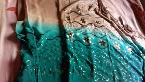 Chiffon Or Suythetic Saree.