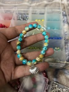 blue Beaded Bracelet with Shell Charm