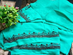Elegant Turquoise Embroidered Saree