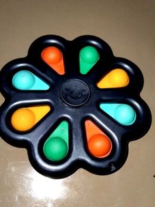 Simple Dimple Spinner Toy