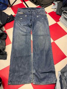 Diesel Distressed Wide Leg Jeans