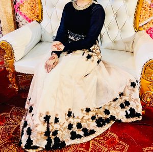 Ethnic Gown With Flairs And Butterfly Flowers
