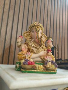 Ganesha Statue with Fruit Offerings