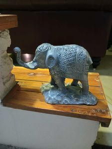 white metal elephant figurine.