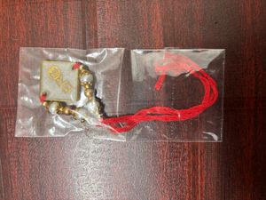 Pack Of 2 Resin Rakhi With A Money Holder