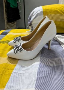 white stilletos
