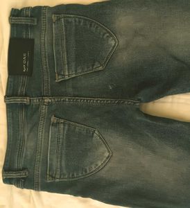 Worn Blue Denim Jeans