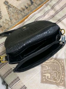 Very New And Extremely Elegant Sling Bag