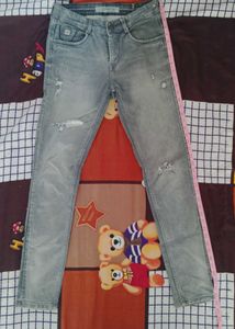 Distressed Gray Denim Jeans