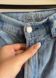 Ripped Denim Jeans with Butterfly Embroidery