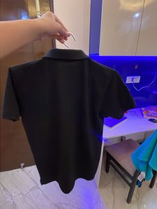Levis black polo t-shirt.