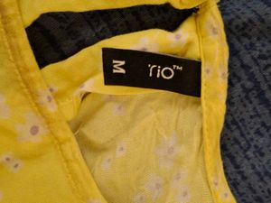 Floral Print Top With Ruffled Trims