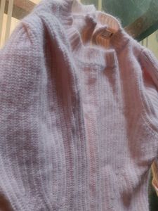 light pink sweater for cozy winters.