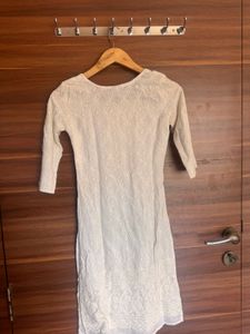 Elegant White Embroidered Kurti