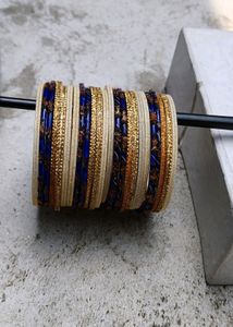 Blue And Cream Colour Fancy Glass Bangles Sets...