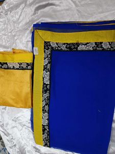Elegant Blue Saree With Yellow Blouse