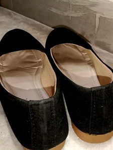 Black velvet slip-on loafers