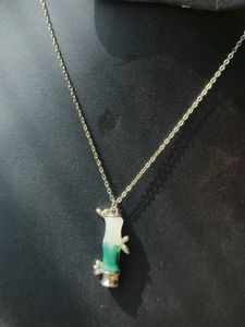Silver Bow Pendant Necklace