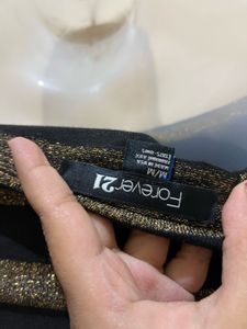 black, long-sleeved, off-the-shoulder top