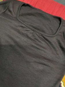 solid brown long-sleeved top