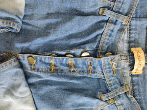 Light Blue Ripped Jeans... Condition--9/10...Size-