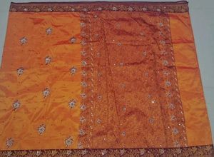 Orange  and maroon Embroidered Saree