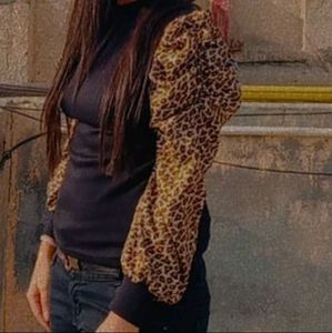 Black Top with Leopard Print Puff Sleeves