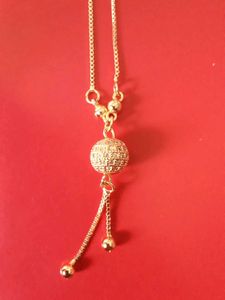 Gold Tone Ball Pendant Necklace