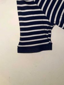Stripes never go out of style Grab this classy pol