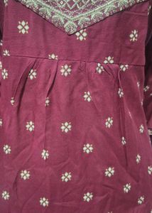 Maroon three piece suit