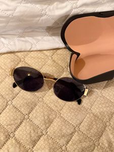Trendy Gold Oval Sunglasses
