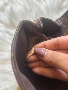 Authentic  Louis Vuitton  Metis East West